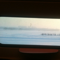 Thumbnail image for Mijn treinraam geeft perfecte uitsnede van sneeuwlandschap.
